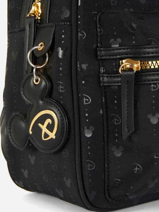 Disney’s Mickey Mouse Gold Tone Monogram Backpack