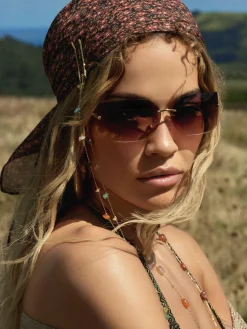 Rita Ora Curved Rimless Sunglasses