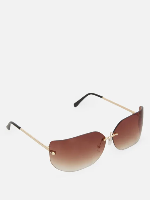 Rita Ora Curved Rimless Sunglasses