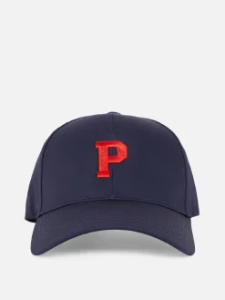 Rita Ora Embroidered Initial Cap
