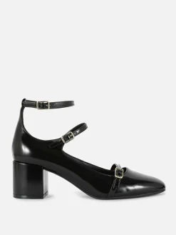 Rita Ora Triple-Strap Mary Jane Heels