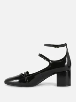 Rita Ora Triple-Strap Mary Jane Heels